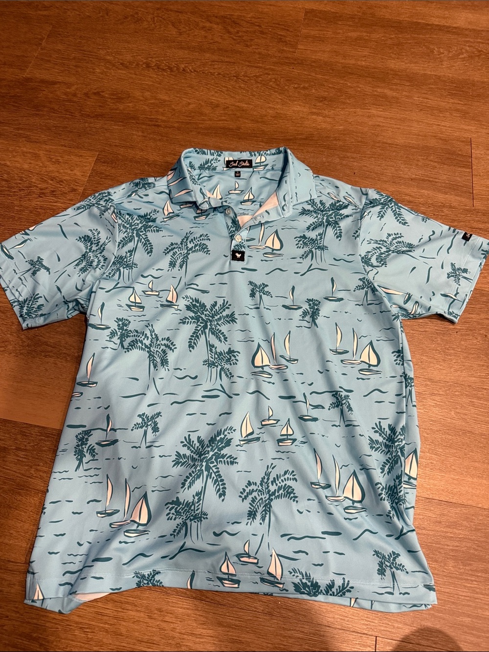 Bad Birdie Light Blue Sailboat & Palm Polo